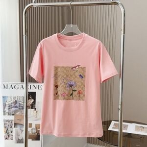 Coach Pink Graphic T-Shirt with Floral Design
